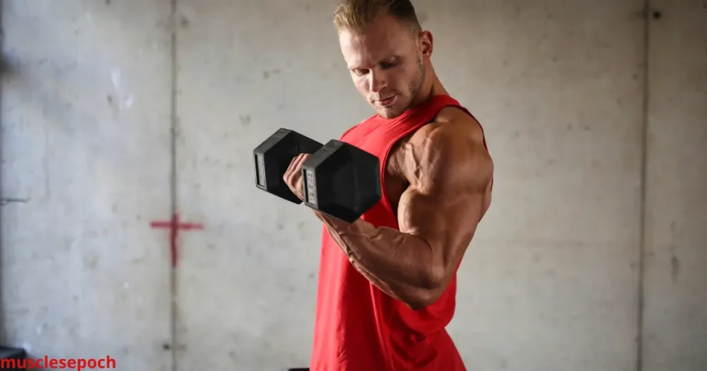 Athlete performing dumbbell curls to build bicep size and definition.