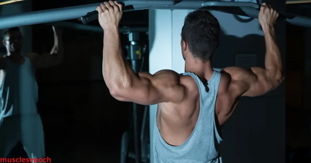 Man performing a bent-over barbell row, a key exercise for building a strong and muscular back.