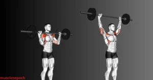 Athlete performing a push press using a barbell, driving the weight overhead with assistance from the legs.