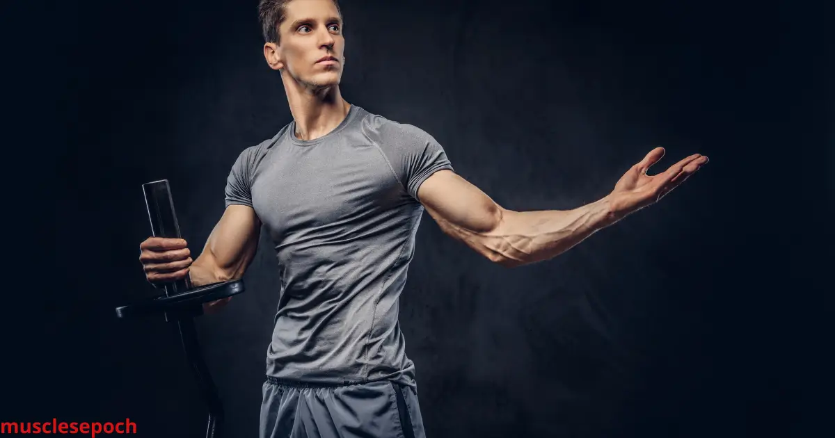 Lean muscular man lifting weights in the gym during a strength training routine for ectomorphs.