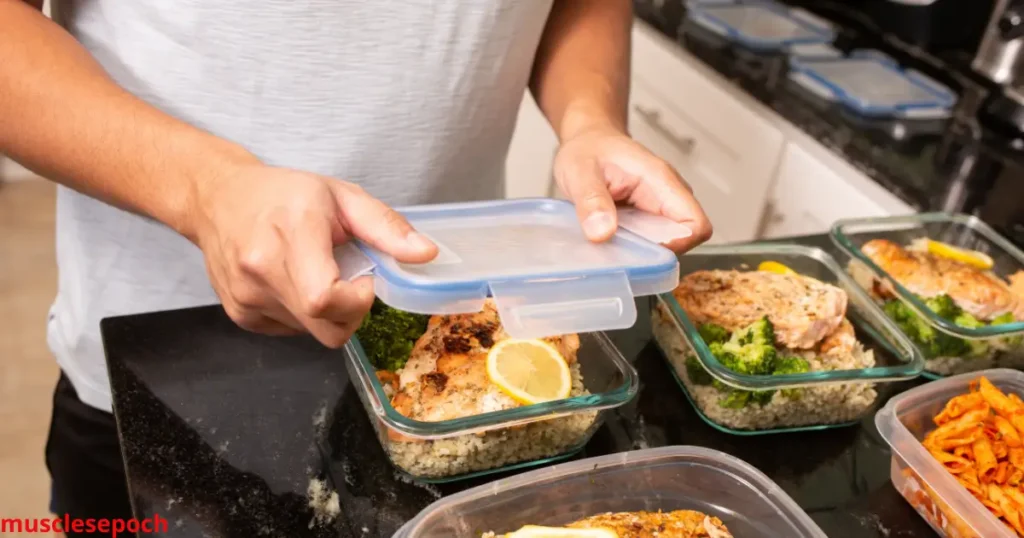 nfographic showing a high-protein 2400 calorie daily meal plan with six balanced meals, macronutrient totals, and muscle-building food options.